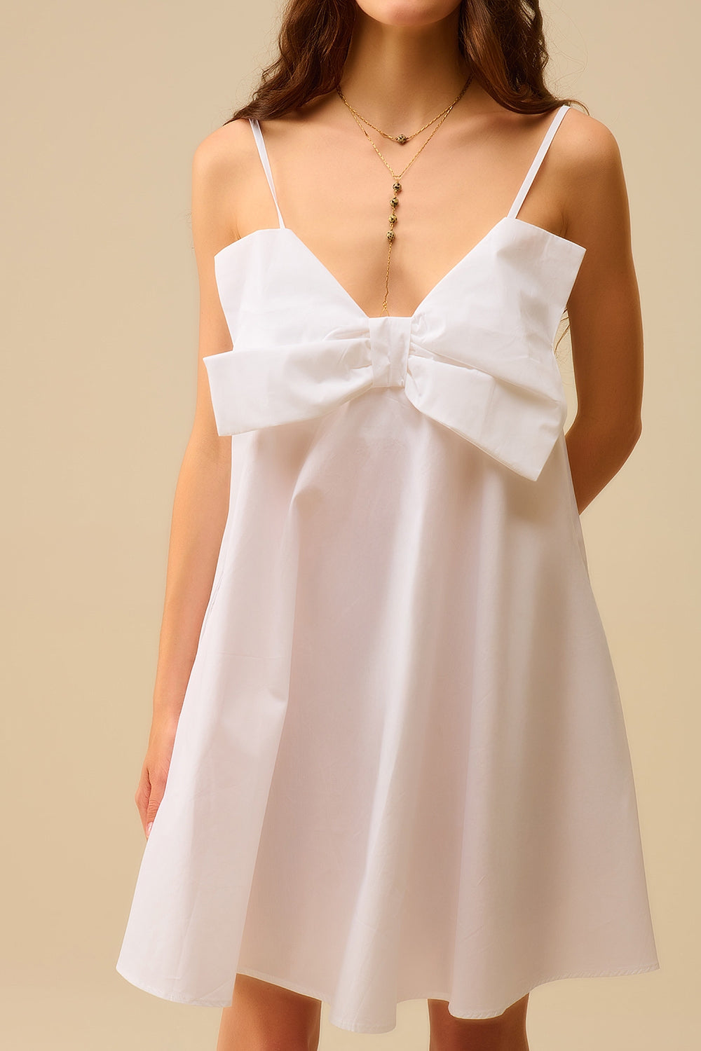 Minivestido de popelín blanco con detalle de gran lazo Q2