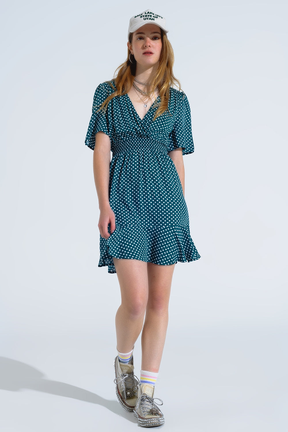 Minivestido verde con cintura ceñida y estampado floral Q2