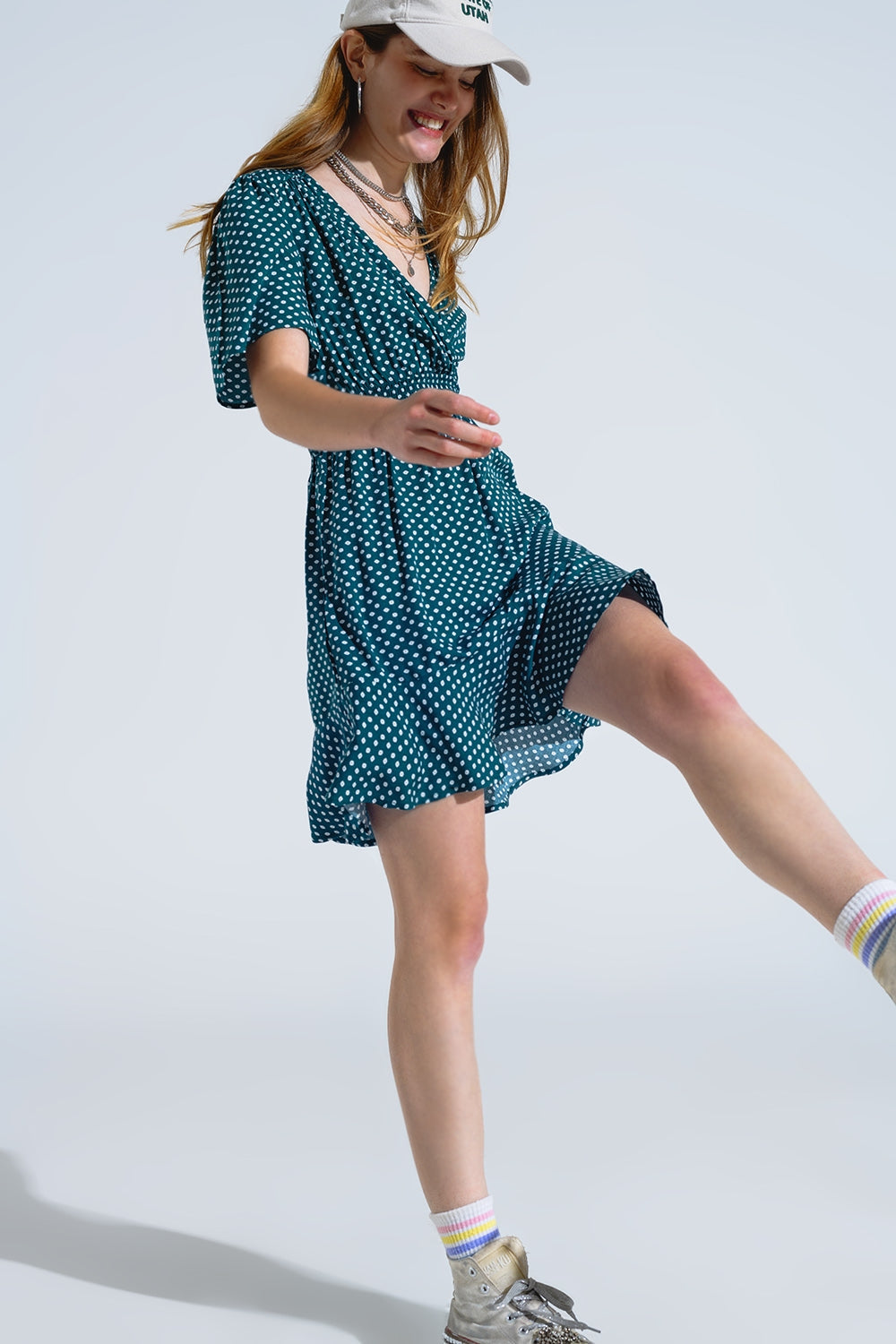 Minivestido verde con cintura ceñida y estampado floral Q2