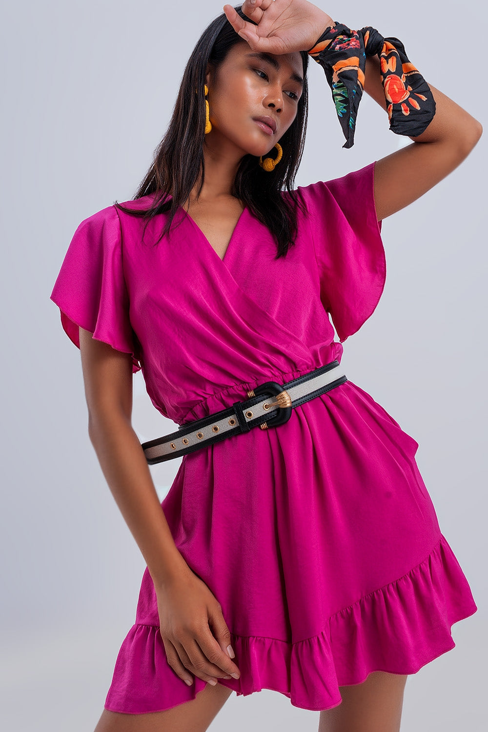 Mono corto cruzado con mangas de angel fucsia Q2