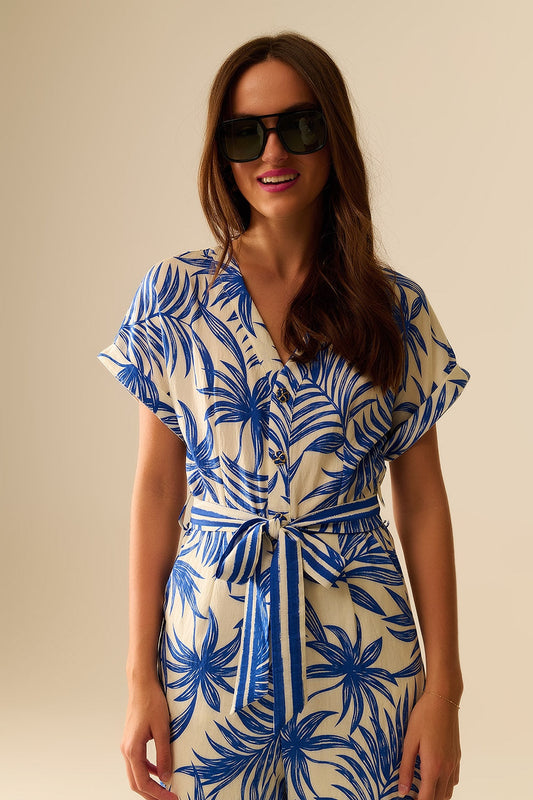 Mono de manga corta con motivo tropical en azul y blanco Q2