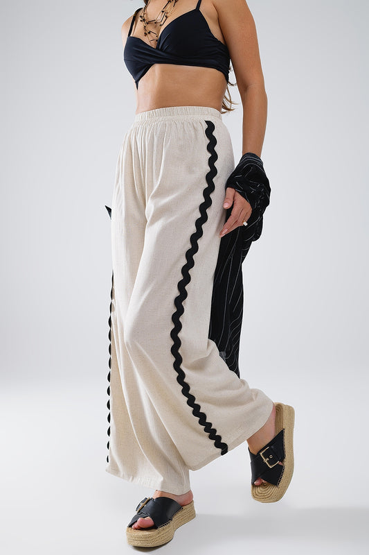 Q2 Pantalón de lino con festón en contraste beige