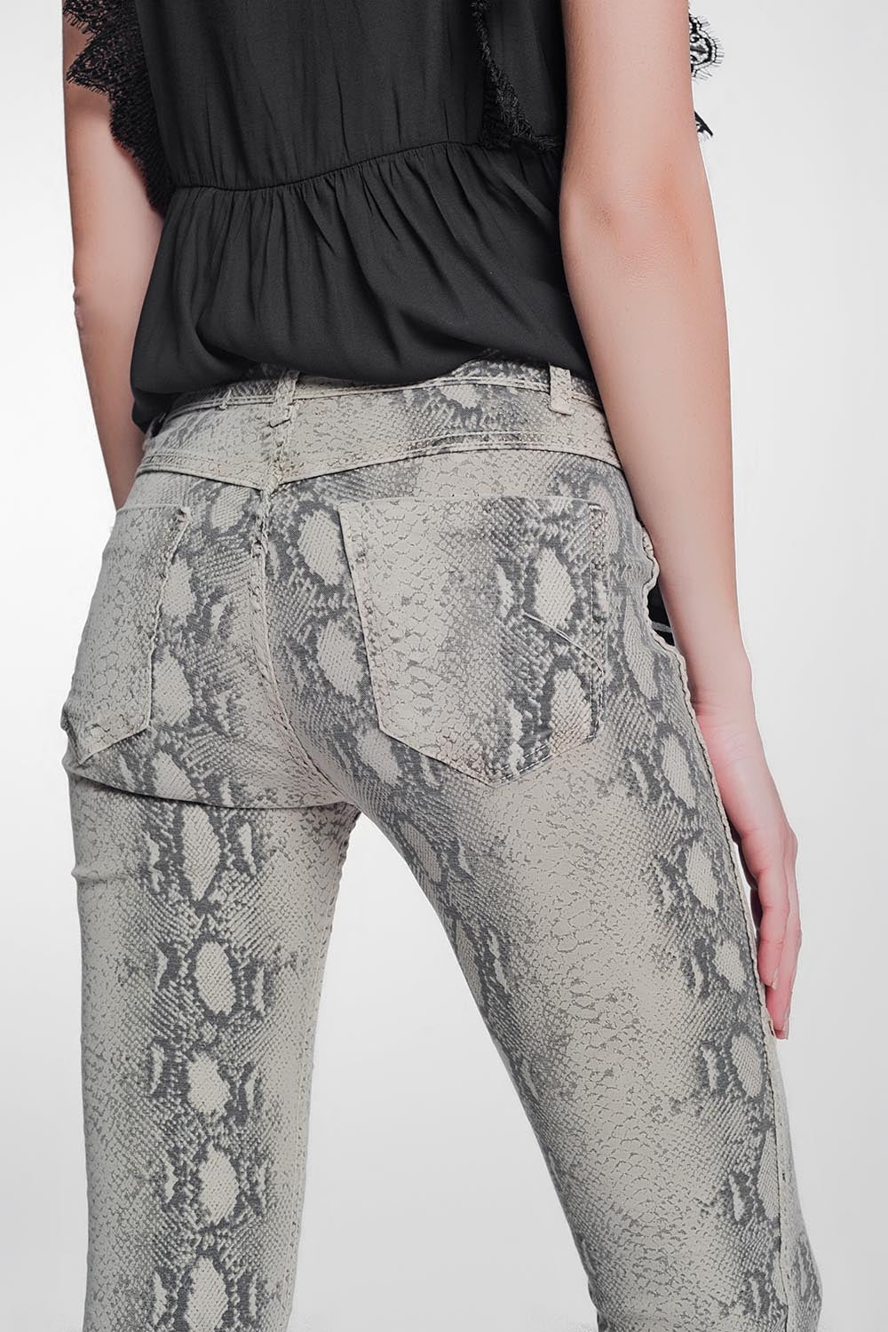 Pantalon estampado serpiente reversible en beige Q2