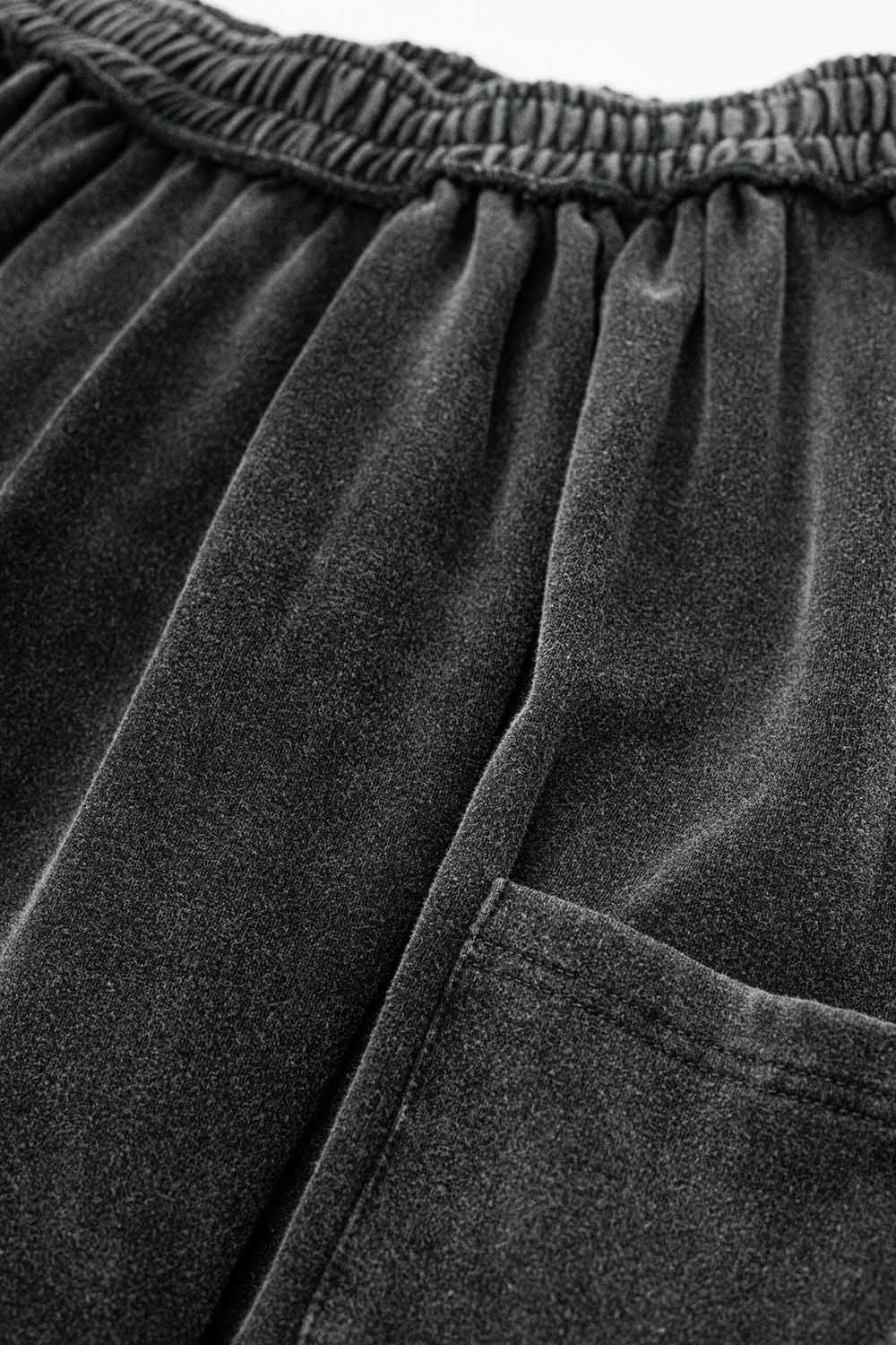 Pantalón jogger gris con cintura elástica y bolsillo lateral Q2
