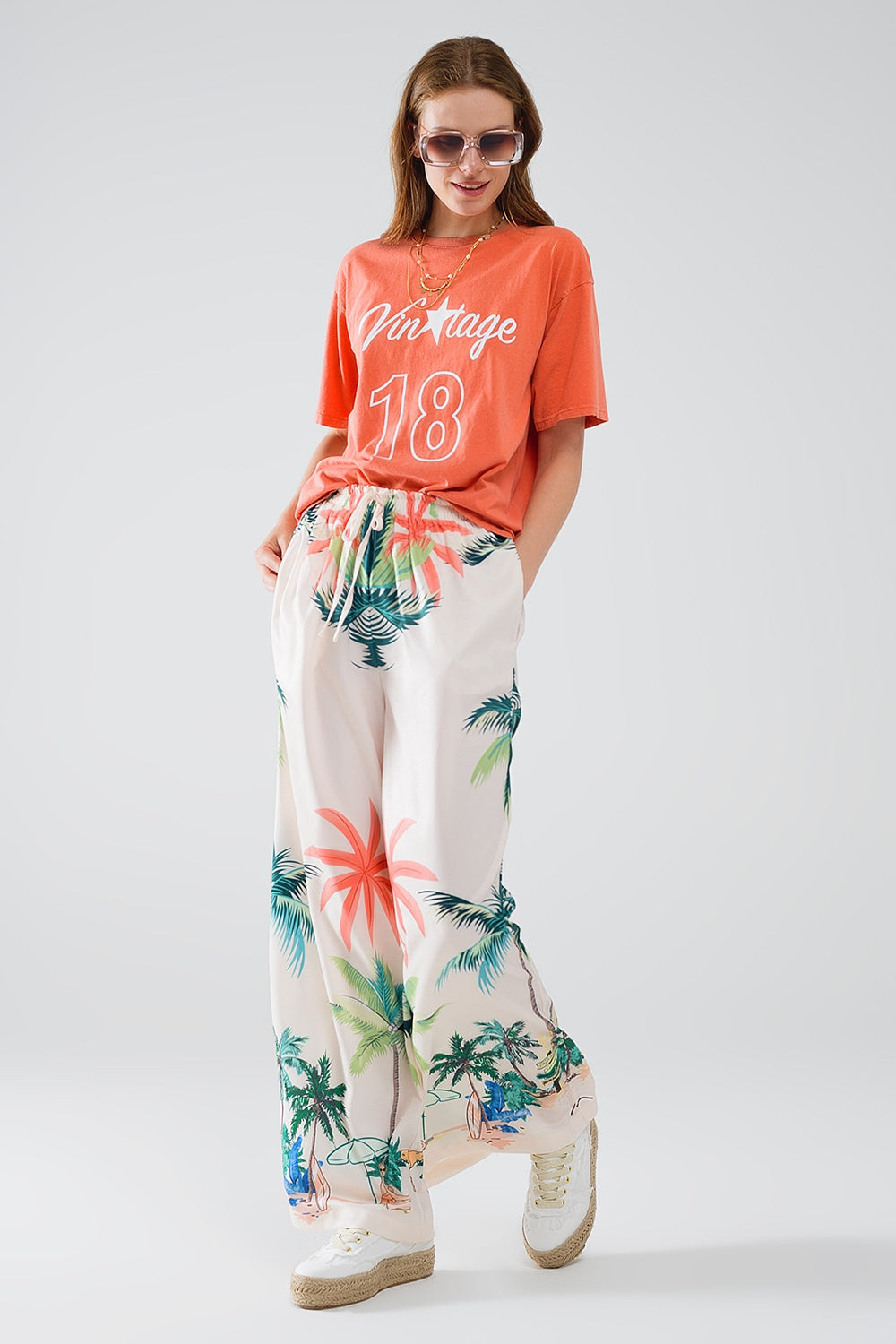 Pantalón recto crema con estampado playero y cintura elástica Q2