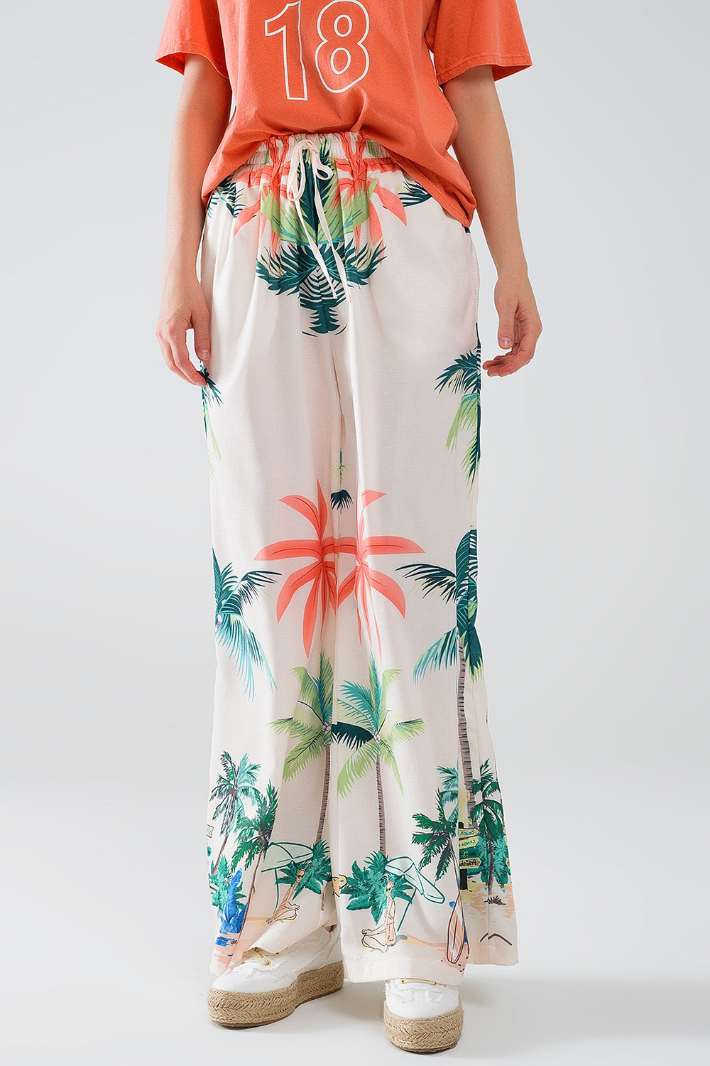 Pantalón recto crema con estampado playero y cintura elástica Q2