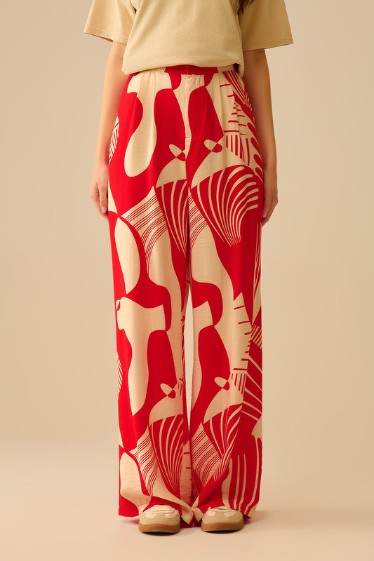 Q2 Pantalón rojo de pata ancha con estampado abstracto