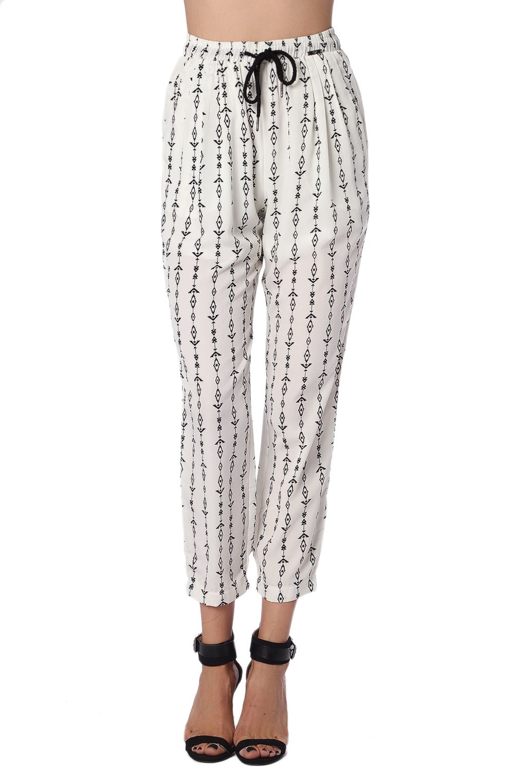 Q2 Pantalones crema con estampado azteca en contraste