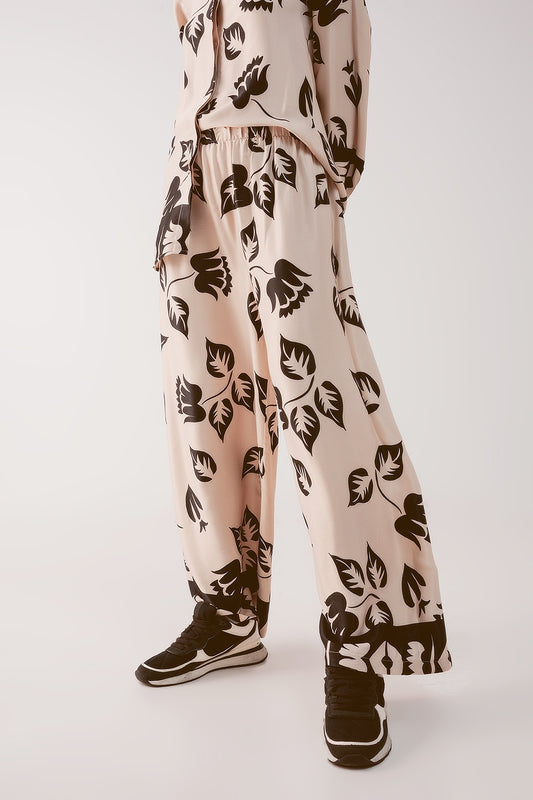 Q2 Pantalones crema elásticos de pernera muy ancha