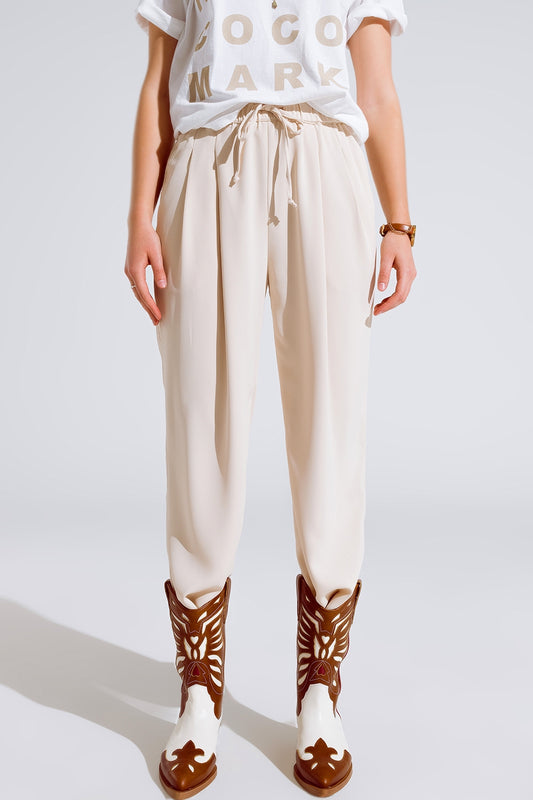 Q2 Pantalones En beige Con Bolsillos Delanteros Y Cierre De Cordón