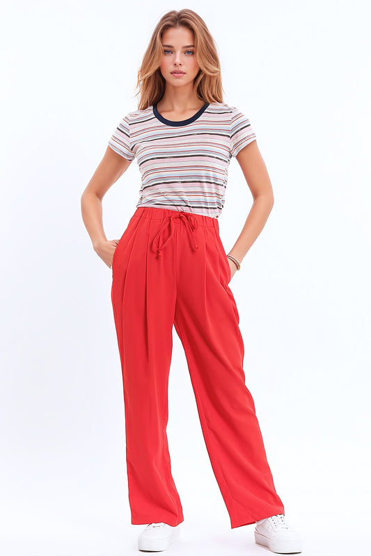 Q2 Pantalones en coral con bolsillos delanteros y cierre de cordón