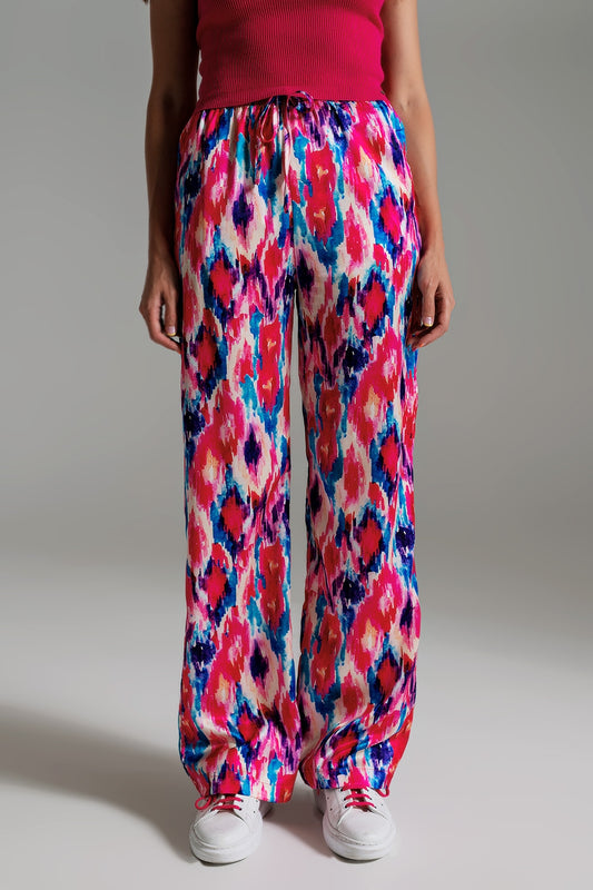 Q2 Pantalones estilo palazzo con estampado abstracto en rosa y azul