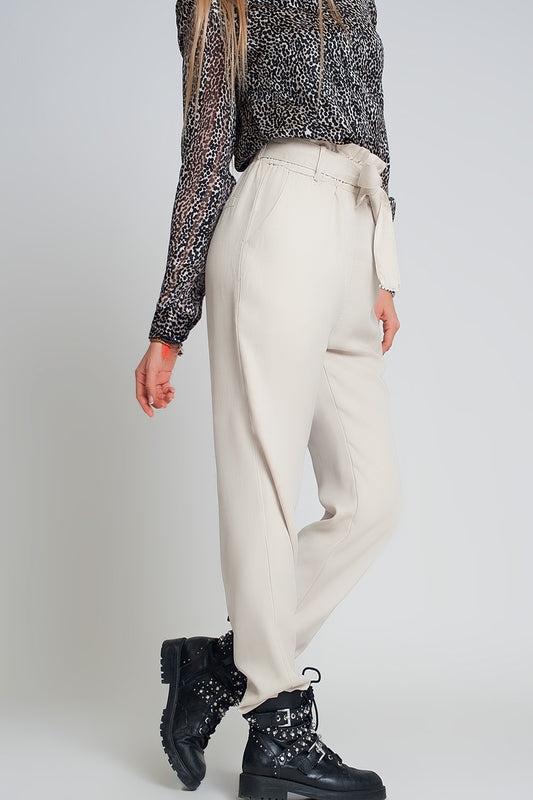 Q2 Pantalones finos con lazada en la cintura en beige