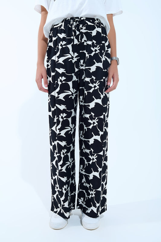Q2 Pantalones rectos con estampado floral hawaiano en blanco y negro