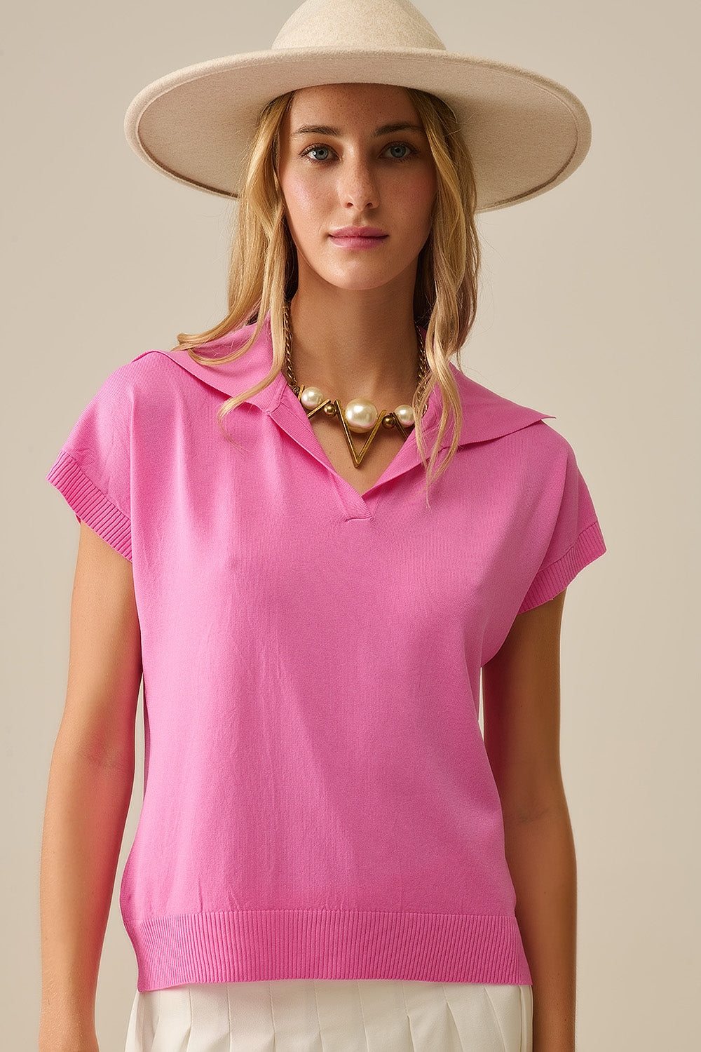 Q2 Polo de punto fino de manga corta en fucsia