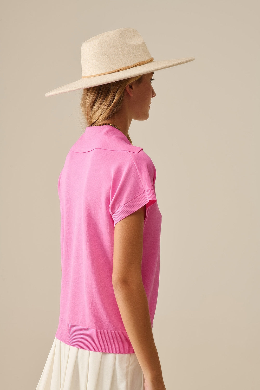 Polo de punto fino de manga corta en fucsia Q2