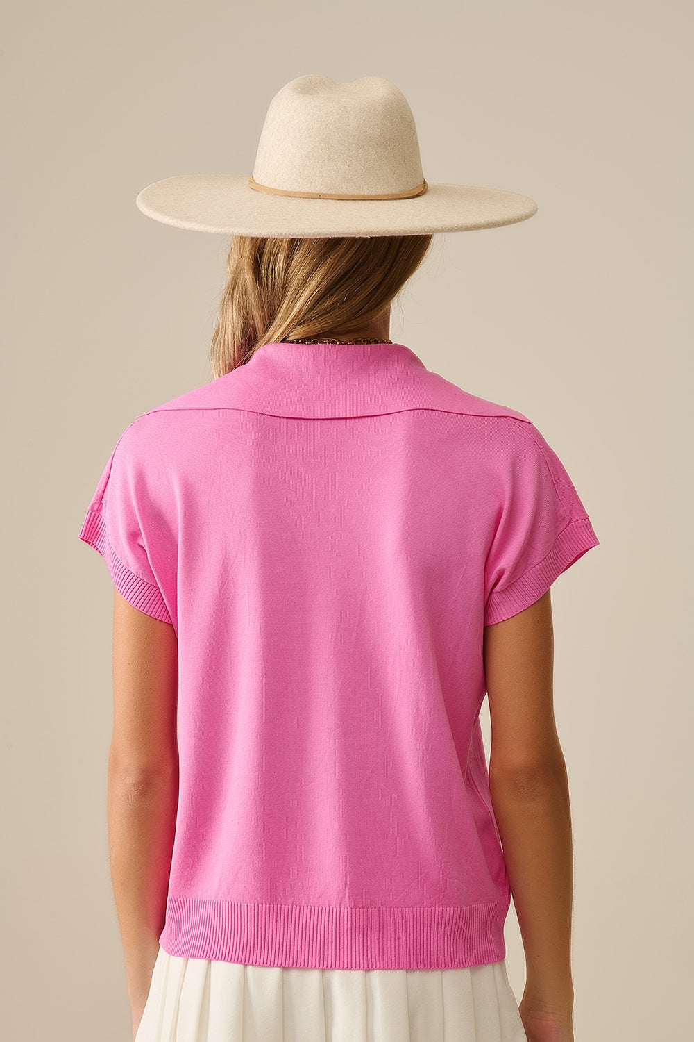 Polo de punto fino de manga corta en fucsia Q2