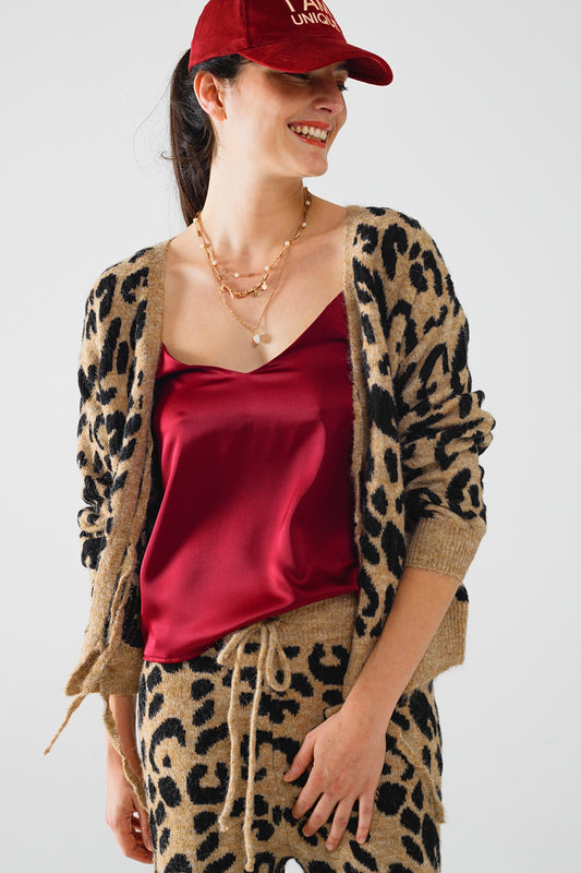 Q2 Rebeca de manga larga con estampado de leopardo y detalle de lazos