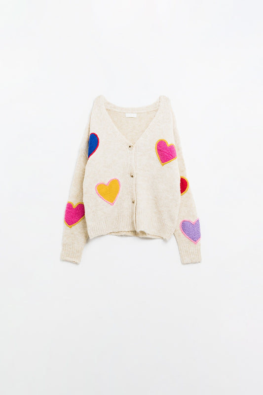 Q2 Rebeca de punto beige con corazones bordados