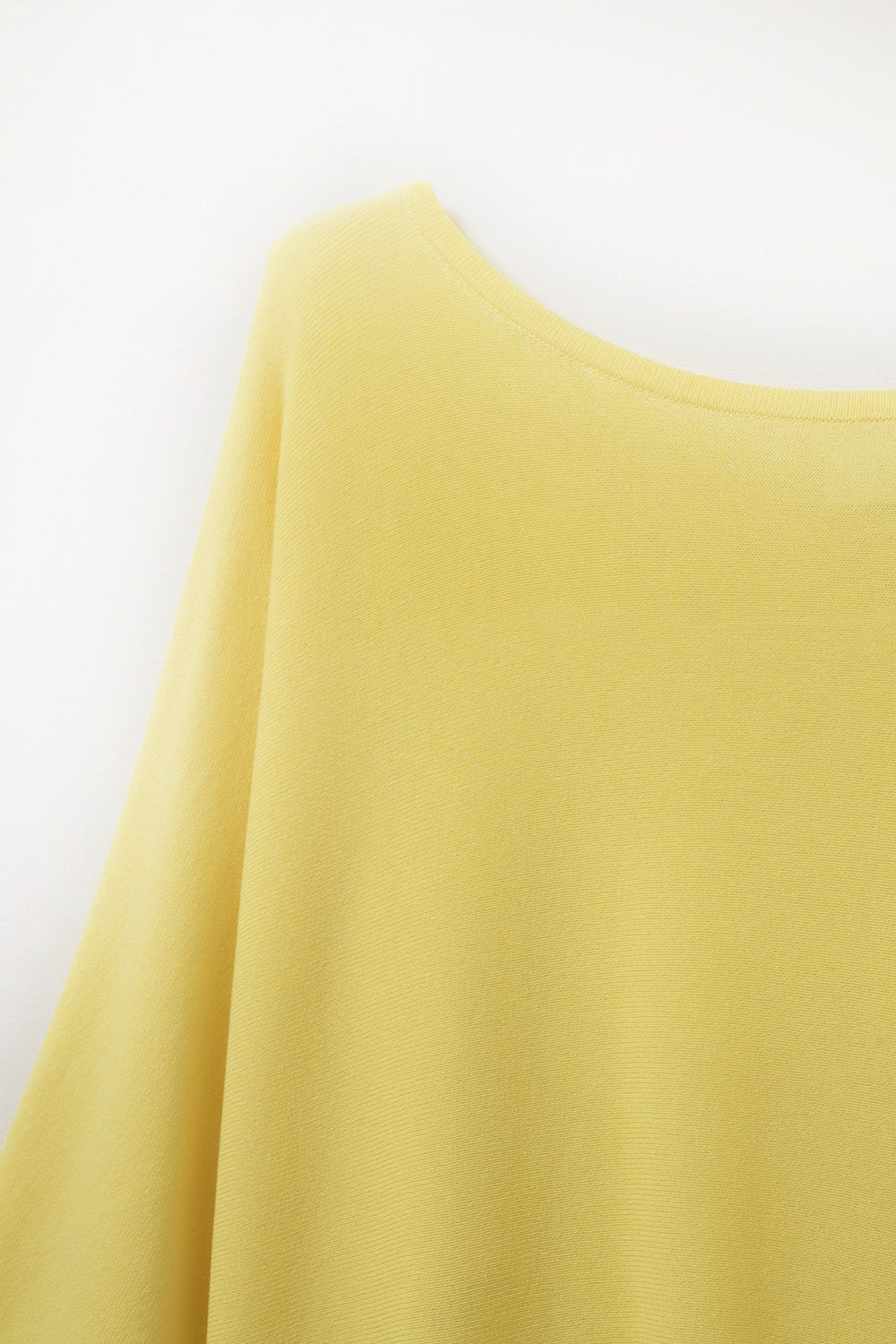 Suéter amarillo oversize con mangas hasta el codo Q2