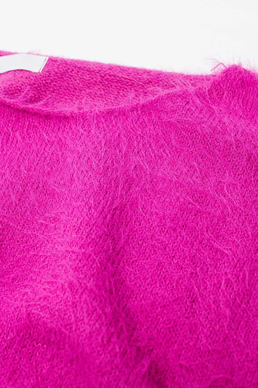 suéter corto esponjoso en fucsia ajustado a la cintura Q2