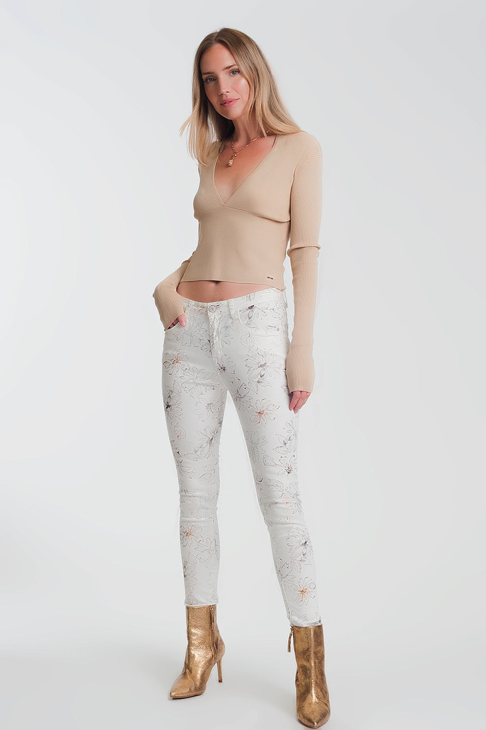 Sueter de canale en beige de cuello pico Q2