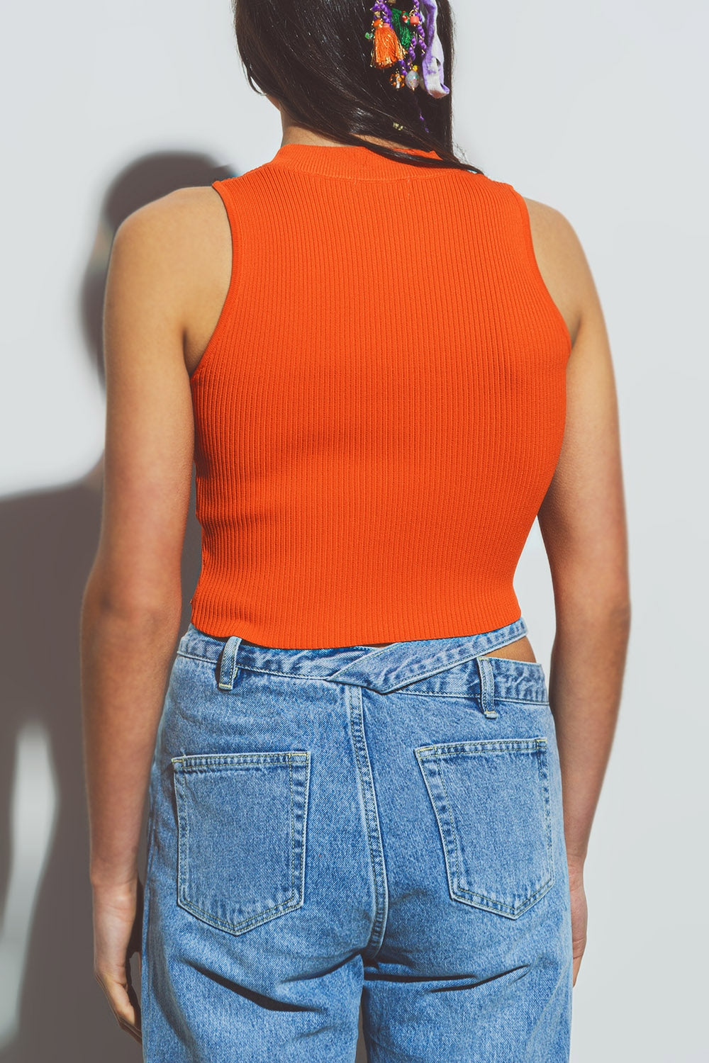 Sueter sin mangas corta en naranja Q2