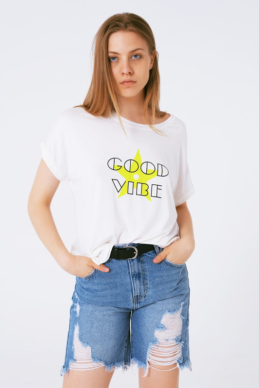 Q2 T-Camiseta Cuello barco Diseño amplio good vibe logo fluor