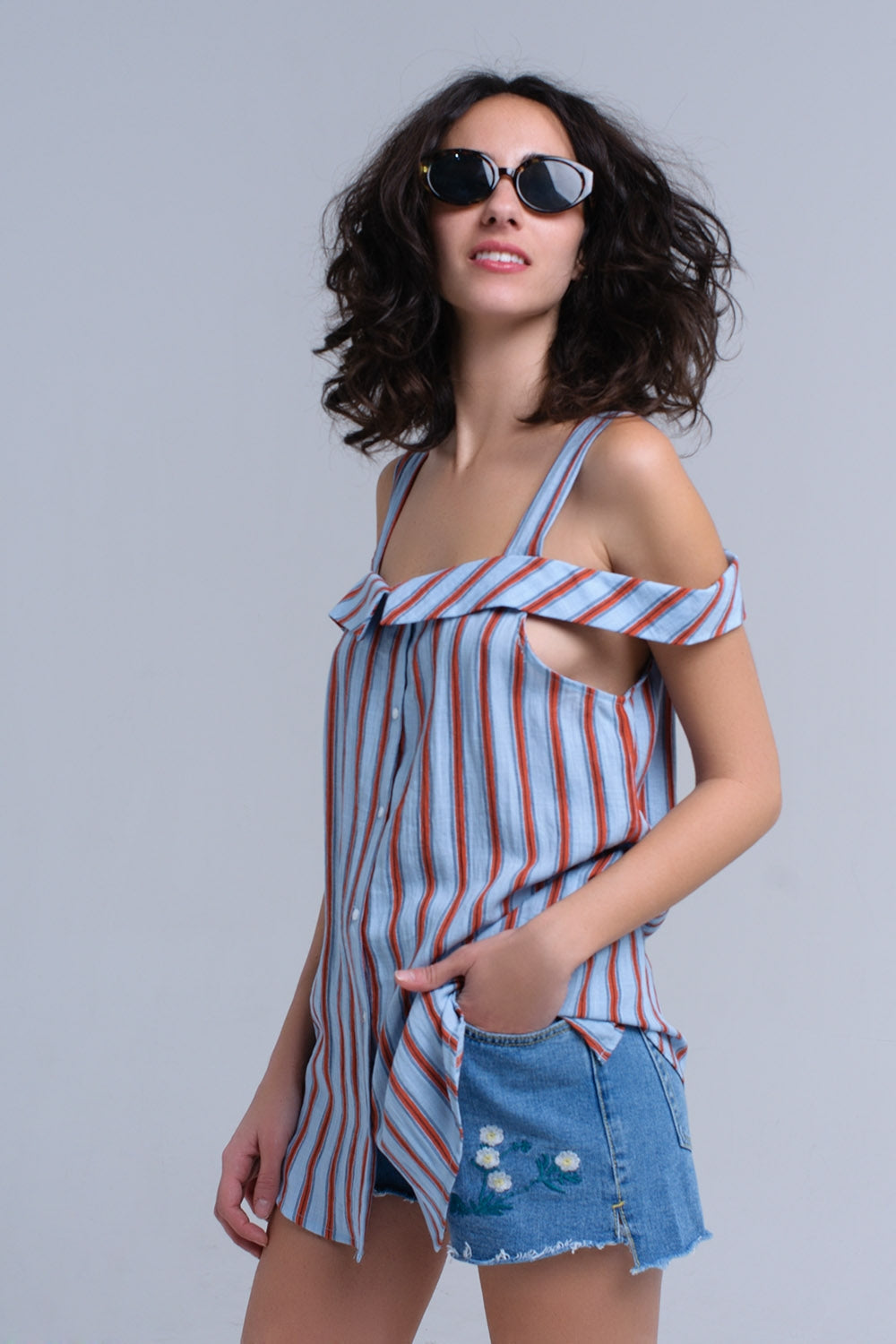 Top azul con rayas naranjas Q2