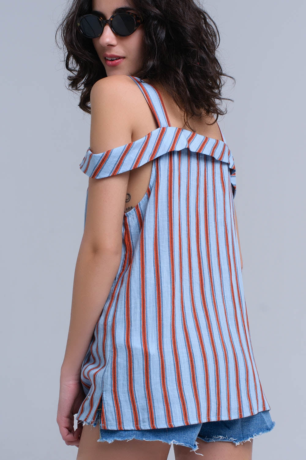 Top azul con rayas naranjas Q2