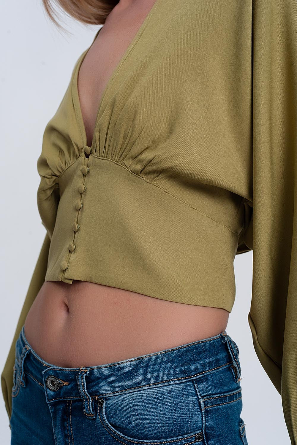 Top con mangas abombadas en verde Q2