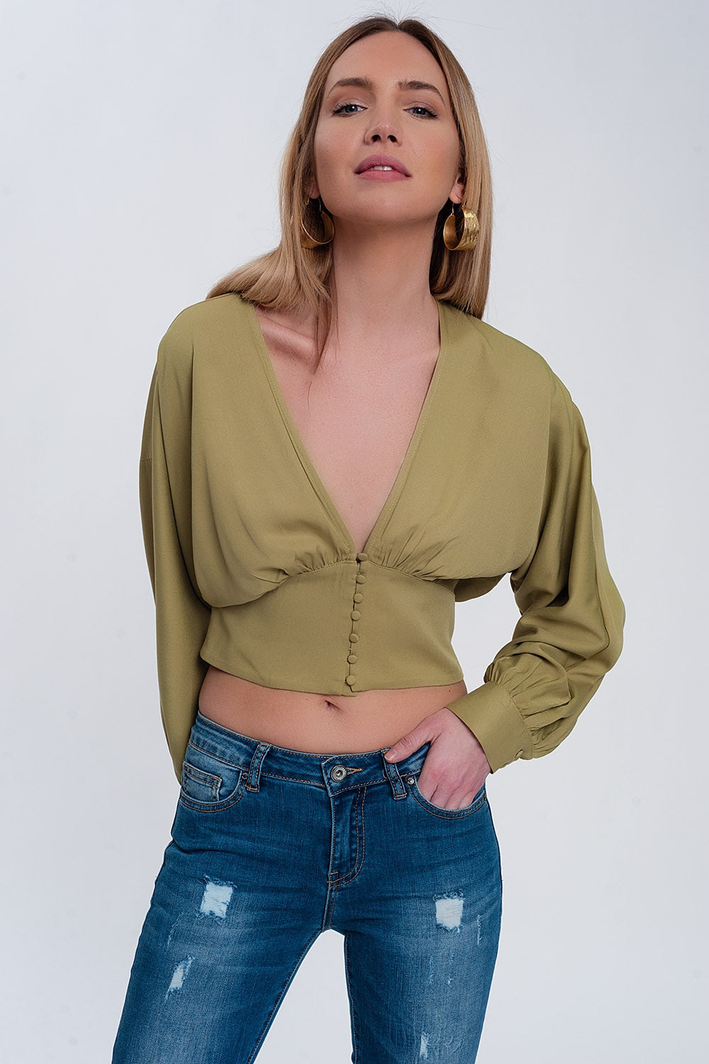 Top con mangas abombadas en verde Q2