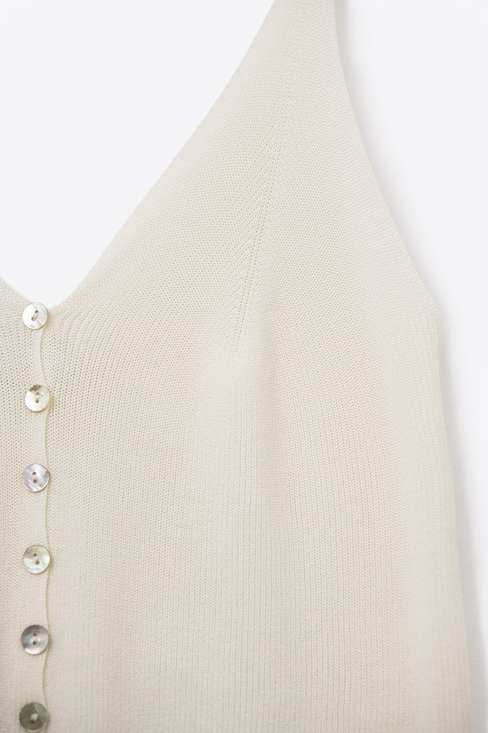 Top corto de punto beige abotonado Q2