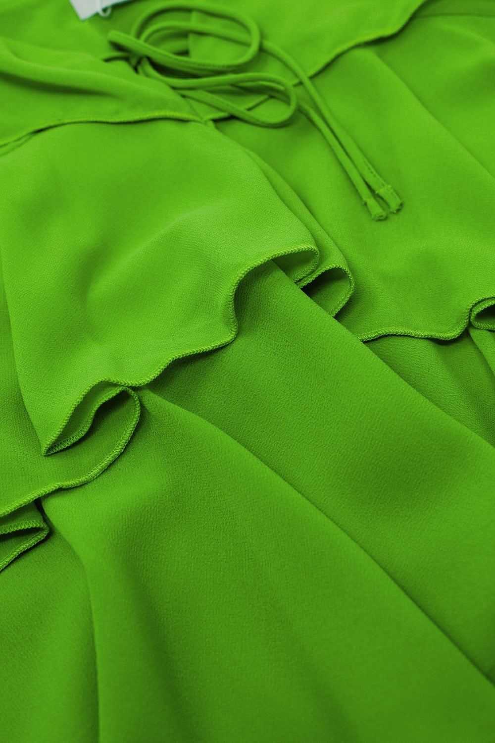 Top de volantes con tirantes finos en verde Q2