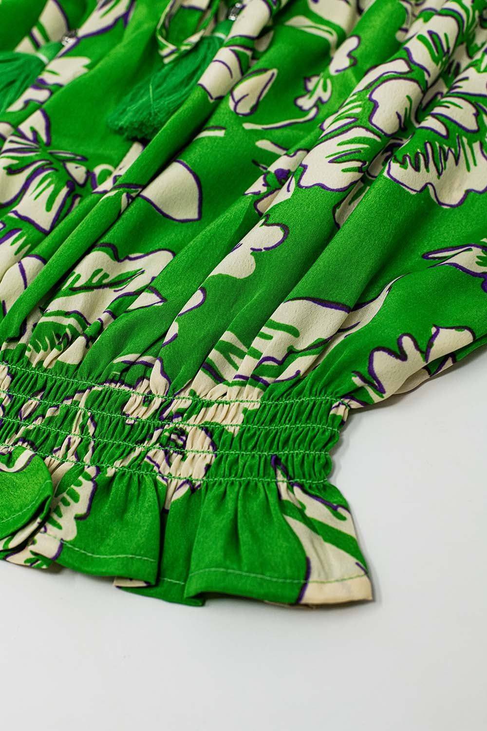 Top verde con hombros descubiertos y cintura elástica en estampado floral Q2