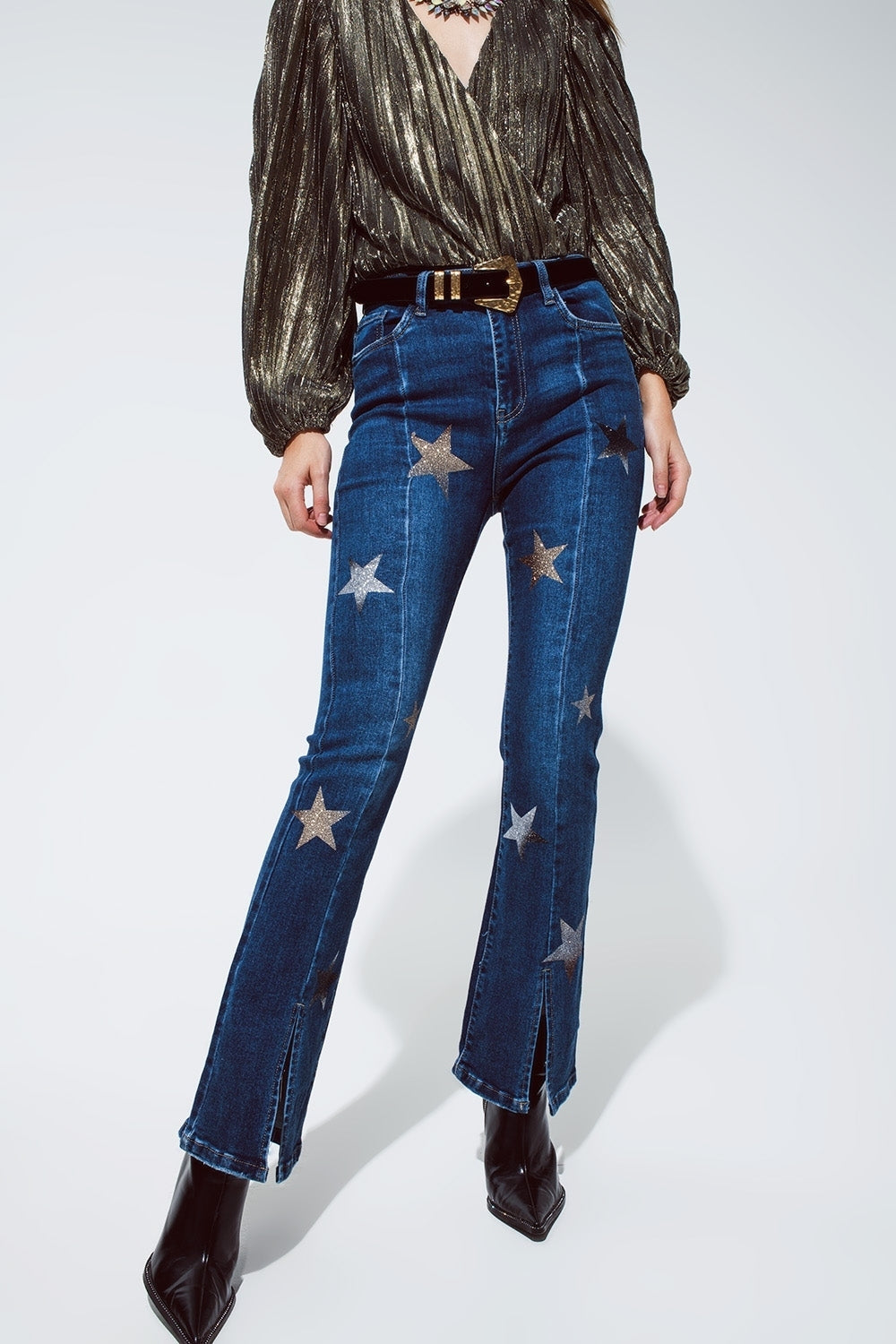Vaqueros acampanados con detalle de estrellas brillantes en azul Q2