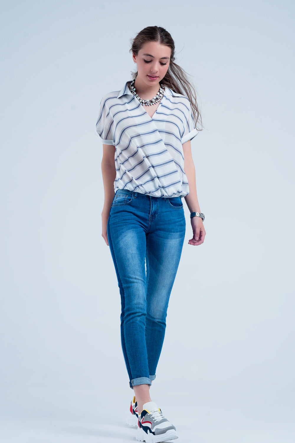 Vaqueros ajustados con raya lateral en azul Q2