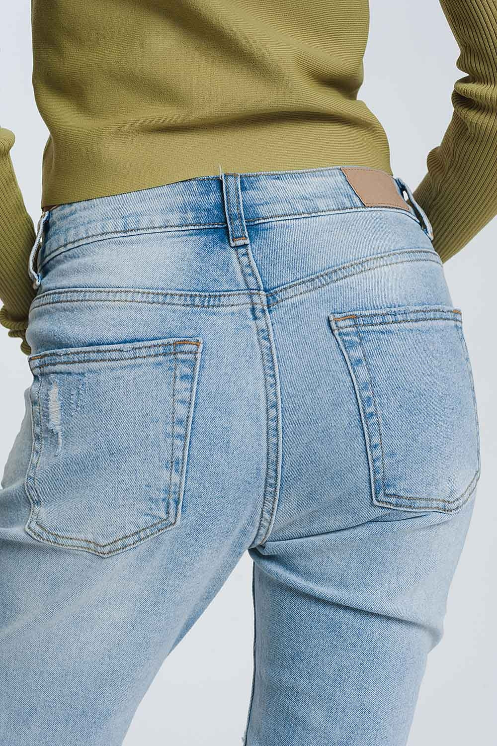Vaqueros Boyfriend azul claro con detalles desgarrados Q2