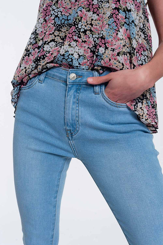 Q2 Vaqueros de corte slim y talle alto en diseño bonito con brillo lavado medio