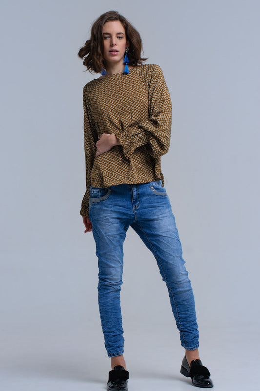 Q2 Vaqueros pitillo azules con detalles de lentejuelas