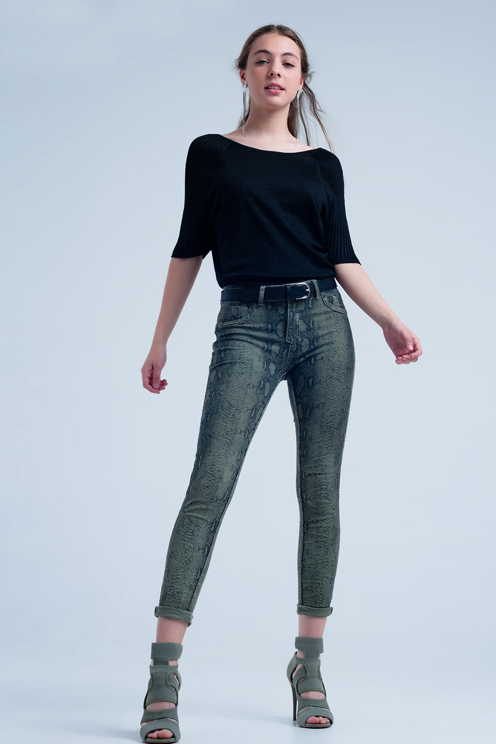 Vaqueros reversibles verdes con estampado de serpiente Q2