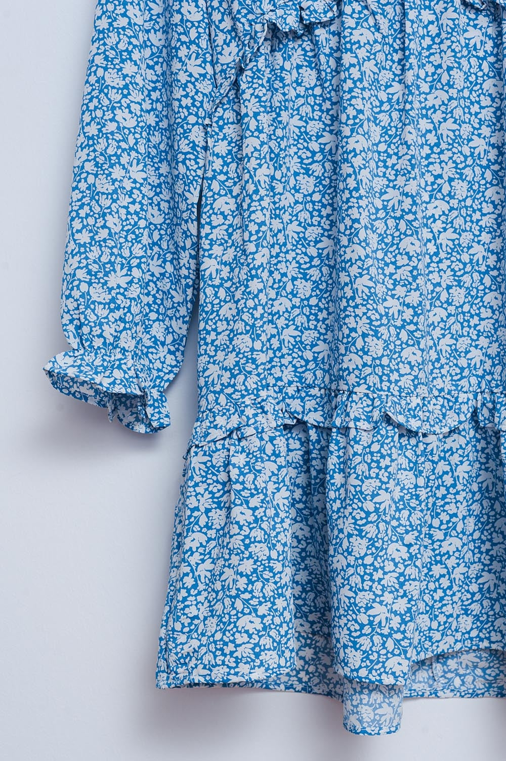 Vestido de tarde corto azul con espalda al aire y estampado de flores Q2